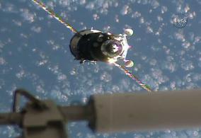 Spacecraft with Japan, U.S., Russia crew docks with ISS