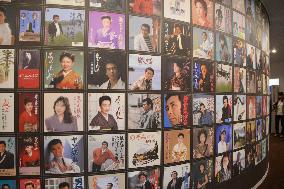 Record album covers on show in memorial hall for composer Funamura in Nikko