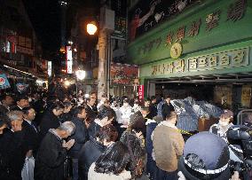 Families pray for victims in fire at Busan indoor shooting range