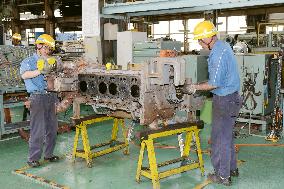 JR West shows press engine assemblage at JR West rail yard