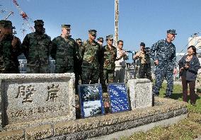 U.S. Navy unveils rediscovered stone monuments