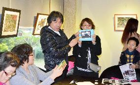 Japanese paper cutout artist holds exhibit, workshop in Shanghai