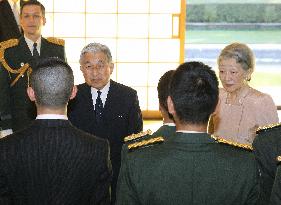 Emperor, empress thank defense force members back from U.N. missi