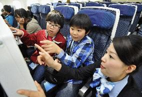 Children from disaster-hit Tohoku invited for B-787 flight