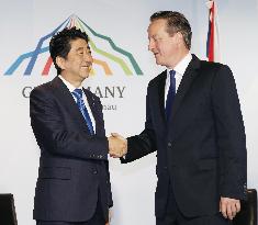 Abe, Cameron meet on G-7 summit sidelines