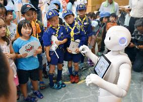 Humanoid robot "Pepper" entertains children in Tottori