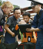 Divers hope to find missing in dam lakes in Tokyo region