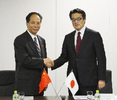 Okada cautions China over Abe statement on 70th war anniversary
