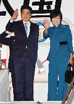 Abe heads home after 7-day trip overseas