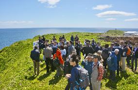 Japanese inspection team on Russian-held island