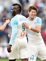 Football: Marseille's Sakai, Balotelli