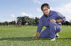 Groundsman tends to Japan rugby training pitches