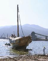 Repair of transport ship replica that survived 2011 tsunami