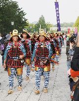 Men in armor walk from Tokyo to shrine in Nikko