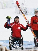 Suzuki wins bronze in men's giant slalom sitting