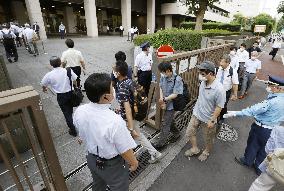 1st trial hearing of ex-Japan justice minister, wife