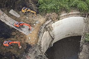 Construction worker thought to have fallen into deep pit
