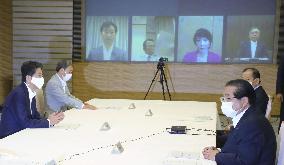 Japan PM Abe at economic report meeting