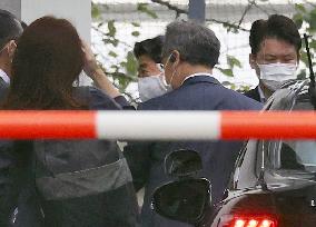 Outgoing Japan PM Abe visits hospital