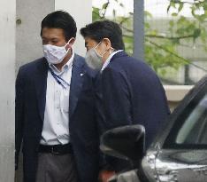 Outgoing Japan PM Abe visits hospital