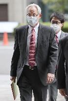 Ex-Nissan executive Kelly goes on trial