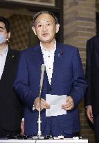 Japan PM Suga holds 1st phone talks with China's Xi