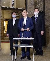 Japan PM Suga holds 1st phone talks with China's Xi