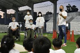 Iniesta at event to help wheelchair users