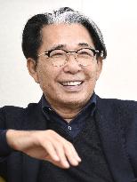 Japanese designer Kenzo Takada dies from COVID-19