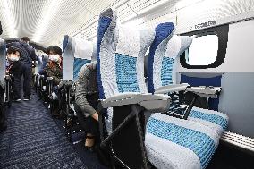 JR Central holds test ride, unveils design of revised maglev train