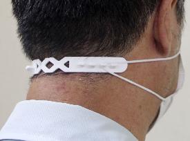 Face mask strap for easing ear pain