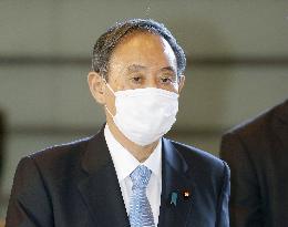 Japan to rethink travel subsidy amid virus resurgence