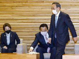 Japan Cabinet OKs 73.6 tril. yen new stimulus to fight virus