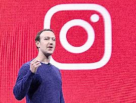 Facebook CEO Zuckerberg and Instagram logo