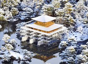 Snow-covered Kinkaku-ji temple