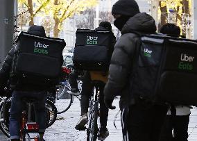 Uber Eats deliverers in Japan