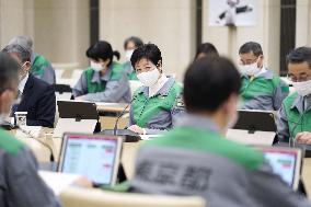 Tokyo Gov. Koike at anti-COVID-19 meeting