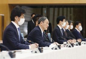 Japan extends virus emergency for Tokyo and other regions to March 7