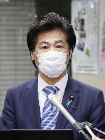 Japan's health minister after AstraZeneca files for vaccine approval