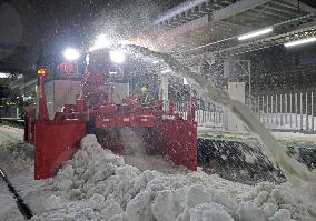 Snow-clearing work at JR station in northern Japan