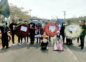 CORRECTED: Funeral of woman killed by riot police in Myanmar