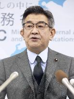 Japan elite bureaucrats punished over scandal involving Suga's son