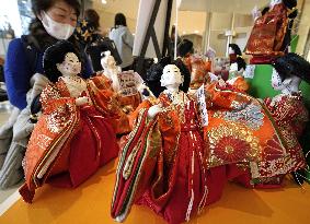 "Hina" Japanese dolls wearing masks