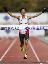 Athletics: Suzuki sets Japanese marathon record