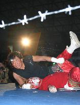 Atsushi Onita in pro-wresting match