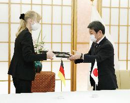 Japan, Germany sign intel-sharing pact