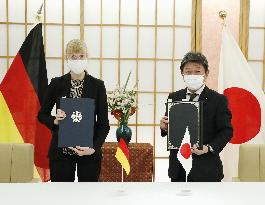 Japan, Germany sign intel-sharing pact