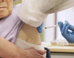 Japan starts COVID-19 vaccinations for elderly
