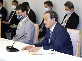 Japan PM Suga meets with medical, nursing association heads