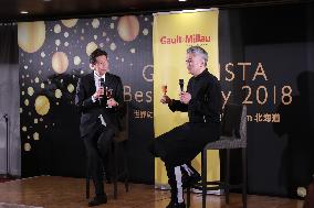 Kazutoshi Narita in conversation with the editor-in-chief of Gault&Millau.